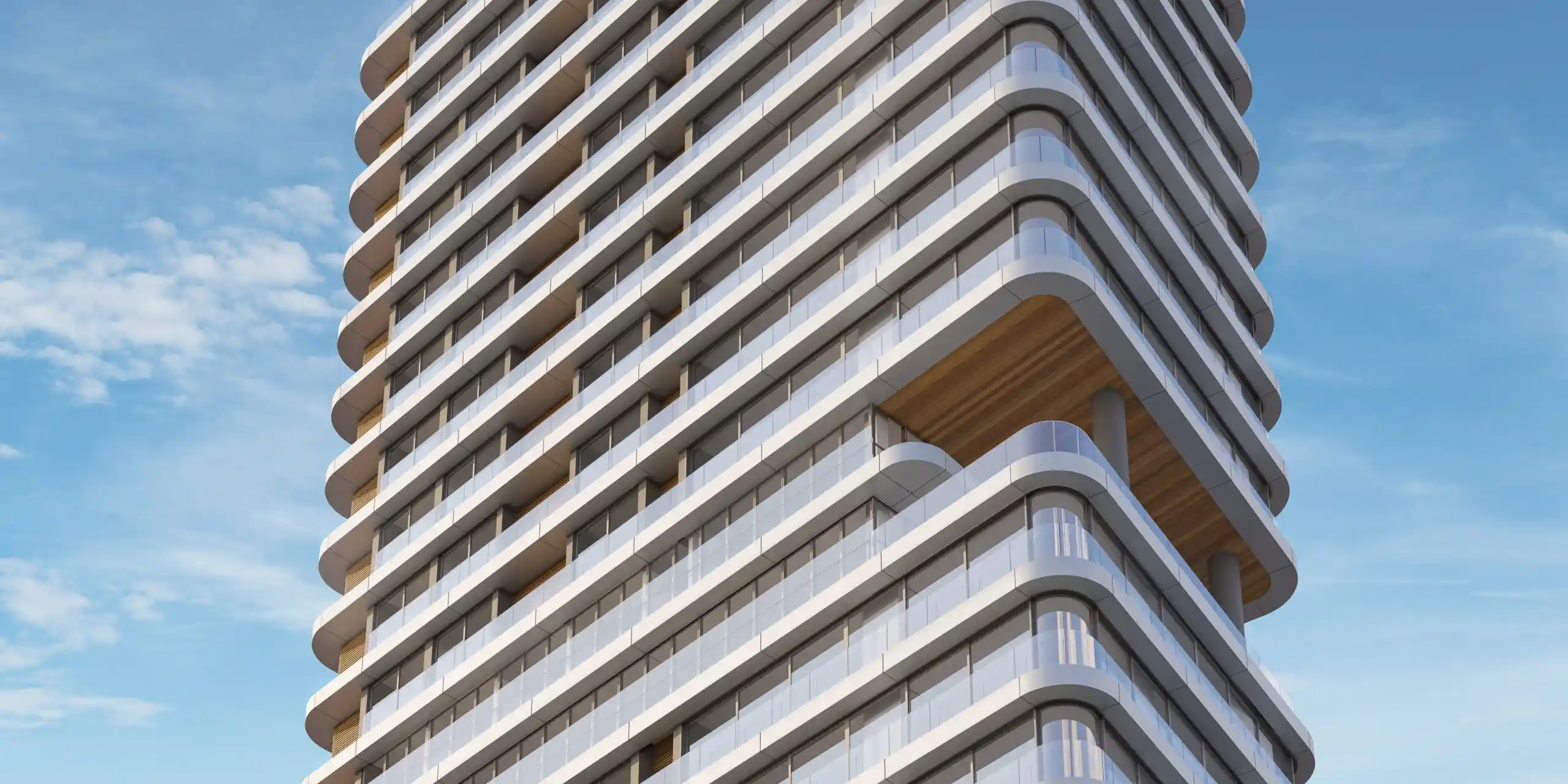 Vista frontal do edifício Legend com fachada orgânica em Torres/RS