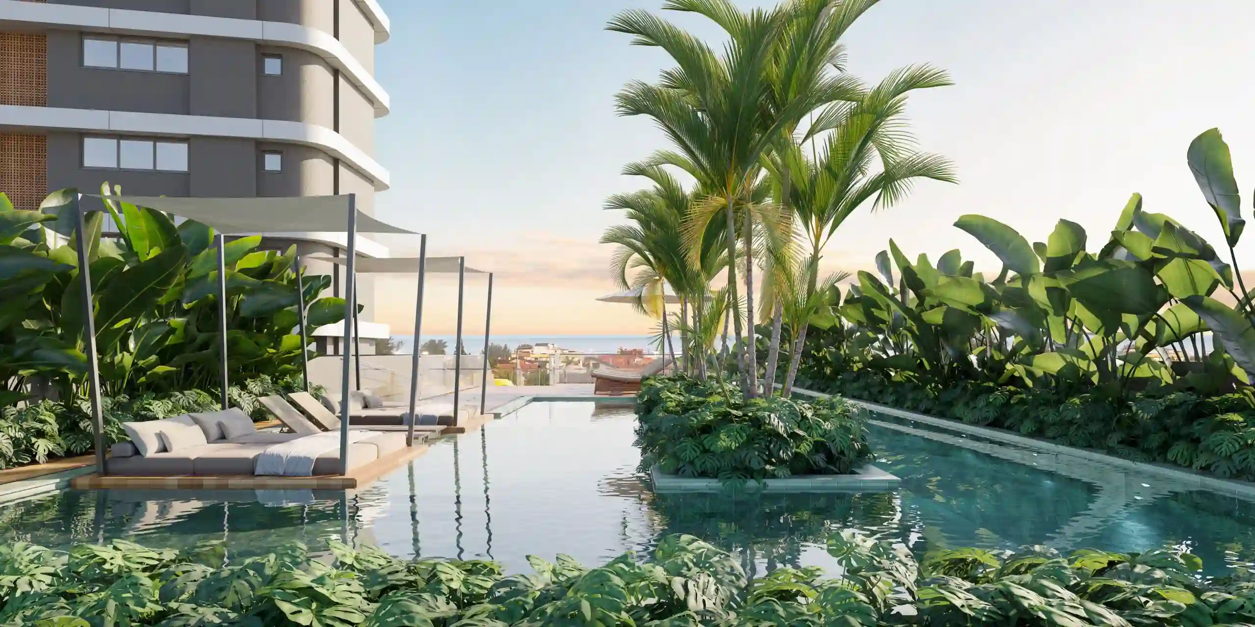 Lounge das águas do Legend integrado à borda de vidro da piscina, com poltronas curvas ao entardecer