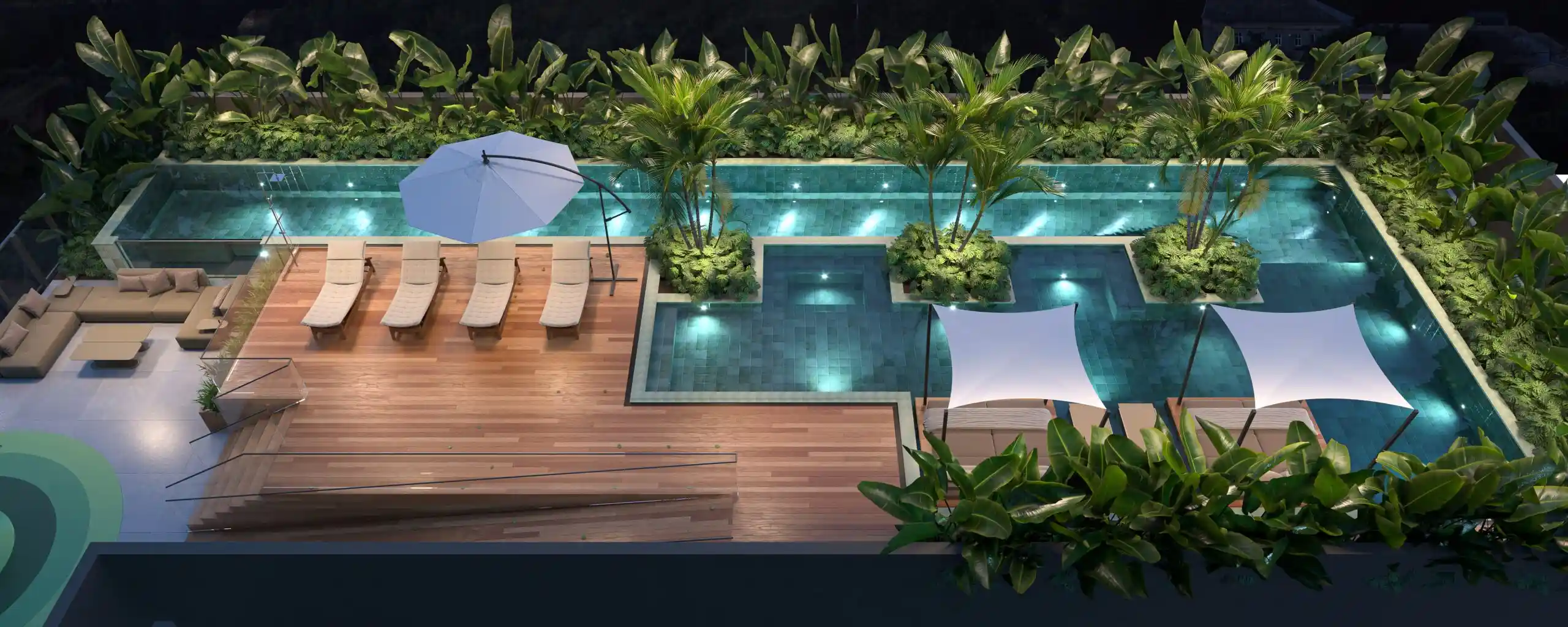 Piscina do Legend com raia semi-olímpica, ilhas verdes separando spa, prainha e piscina infantil ao pôr do sol
